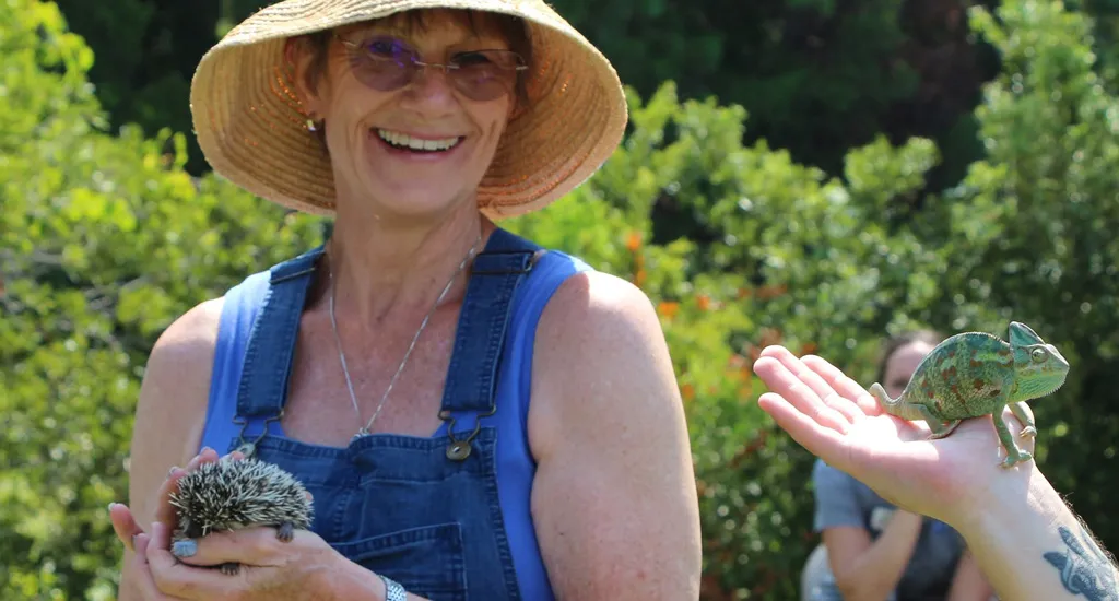 Brightwater | Social Events | Farm To Table | Woman Holding Hedgehog