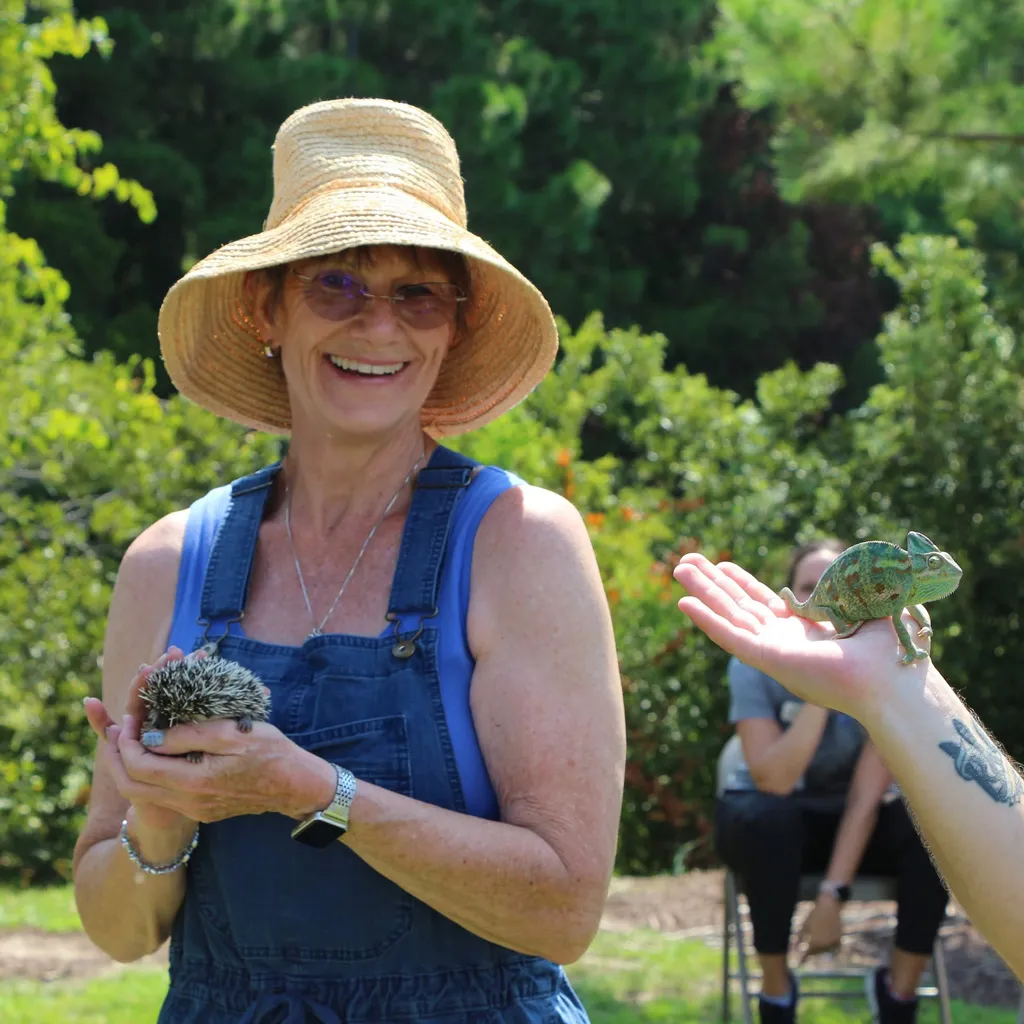 Brightwater | Social Events | Farm To Table | Woman Holding Hedgehog