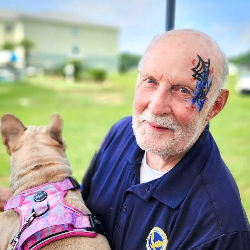 Brightwater | Social Events | Farm To Table | Member Holding His Dog