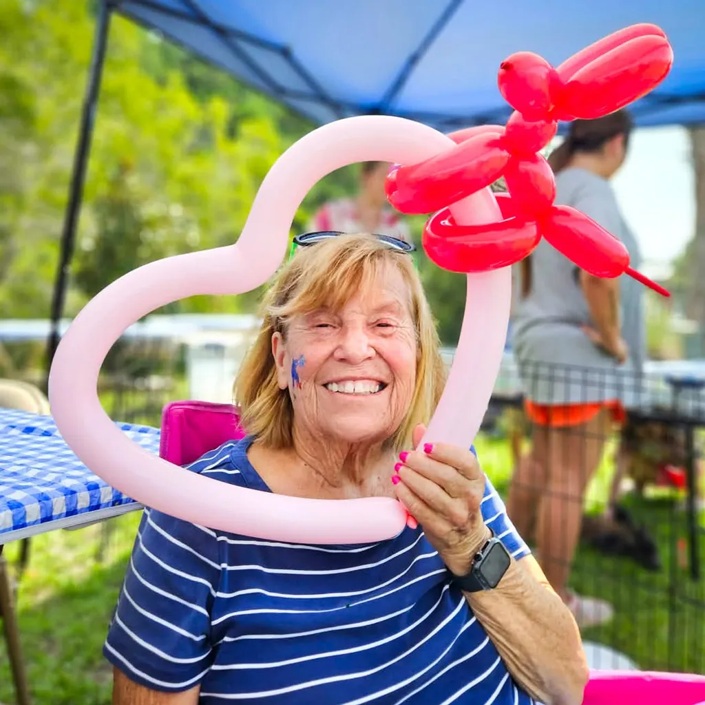 woman with balloon heart