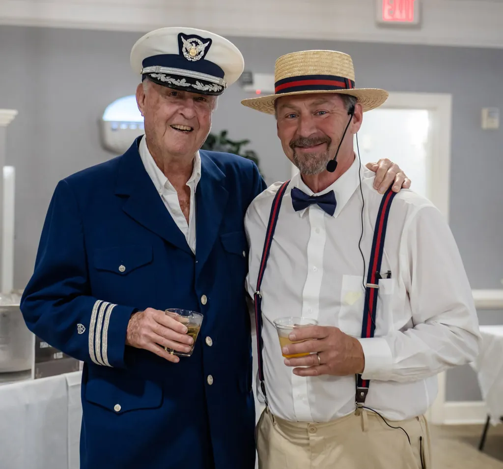 2 pals dressed in sailor and river boat costumes